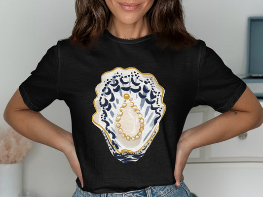 Black t-shirt featuring a stylized oyster shell with pearls.