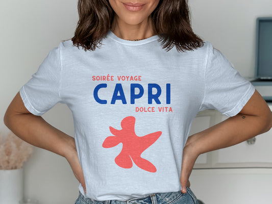 White t-shirt with "Soirée Voyage Capri Dolce Vita" and red abstract shape.