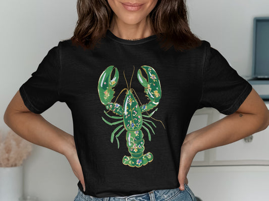 Black t-shirt with a green ornamental lobster design.