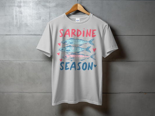 White t-shirt with "SARDINE SEASON" and three illustrated sardines.