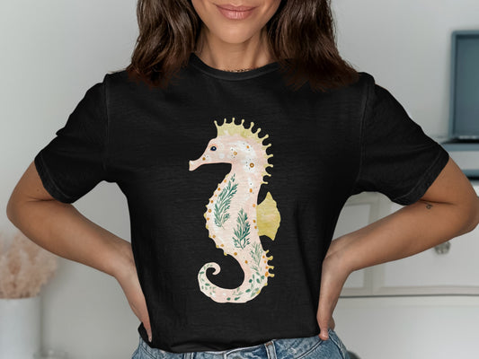 Black t-shirt with a floral seahorse graphic.