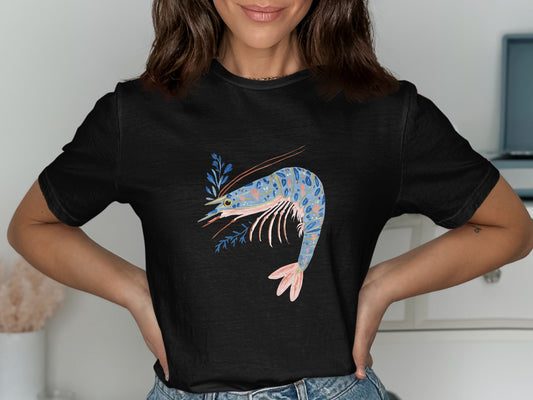 Black t-shirt with a blue and orange shrimp graphic and floral accents.