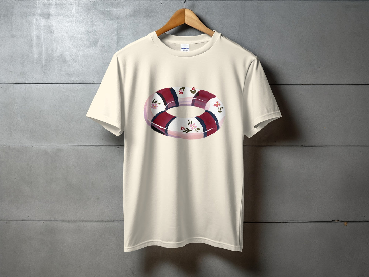 Cream t-shirt with a circular floral pattern.