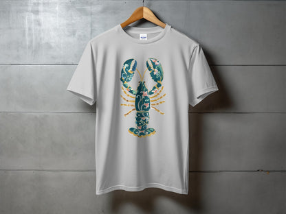 White t-shirt featuring a stylized blue and green floral lobster design.