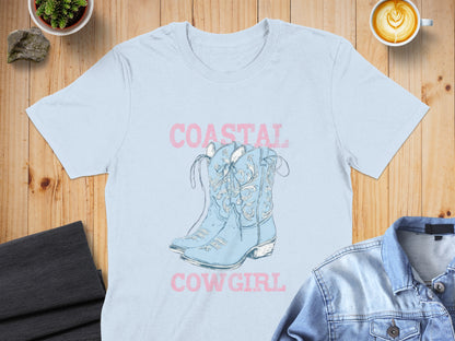 Light blue cowboy boots graphic on a pale blue t-shirt, text "COASTAL COWGIRL".