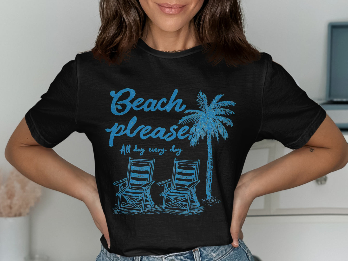 Black t-shirt with "Beach please, all day every day" and palm tree illustration.