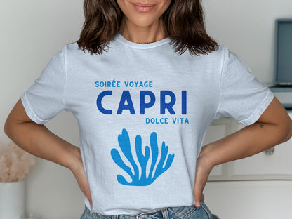 White t-shirt with blue text "SOIRÉE VOYAGE CAPRI DOLCE VITA" and coral graphic.