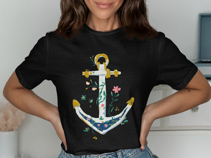 Black t-shirt with a white, blue, and gold anchor design with floral accents.