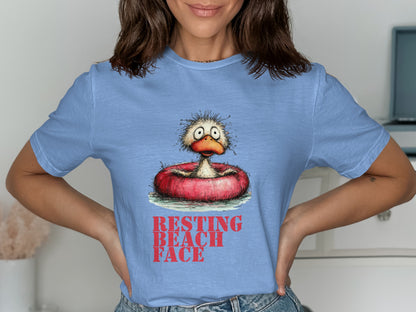 T-shirt with cartoon duck in inner tube, "Resting Beach Face" text.