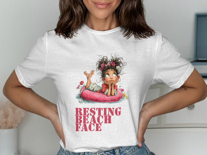 White t-shirt featuring a cartoon girl on a pink float, "Resting Beach Face" text.