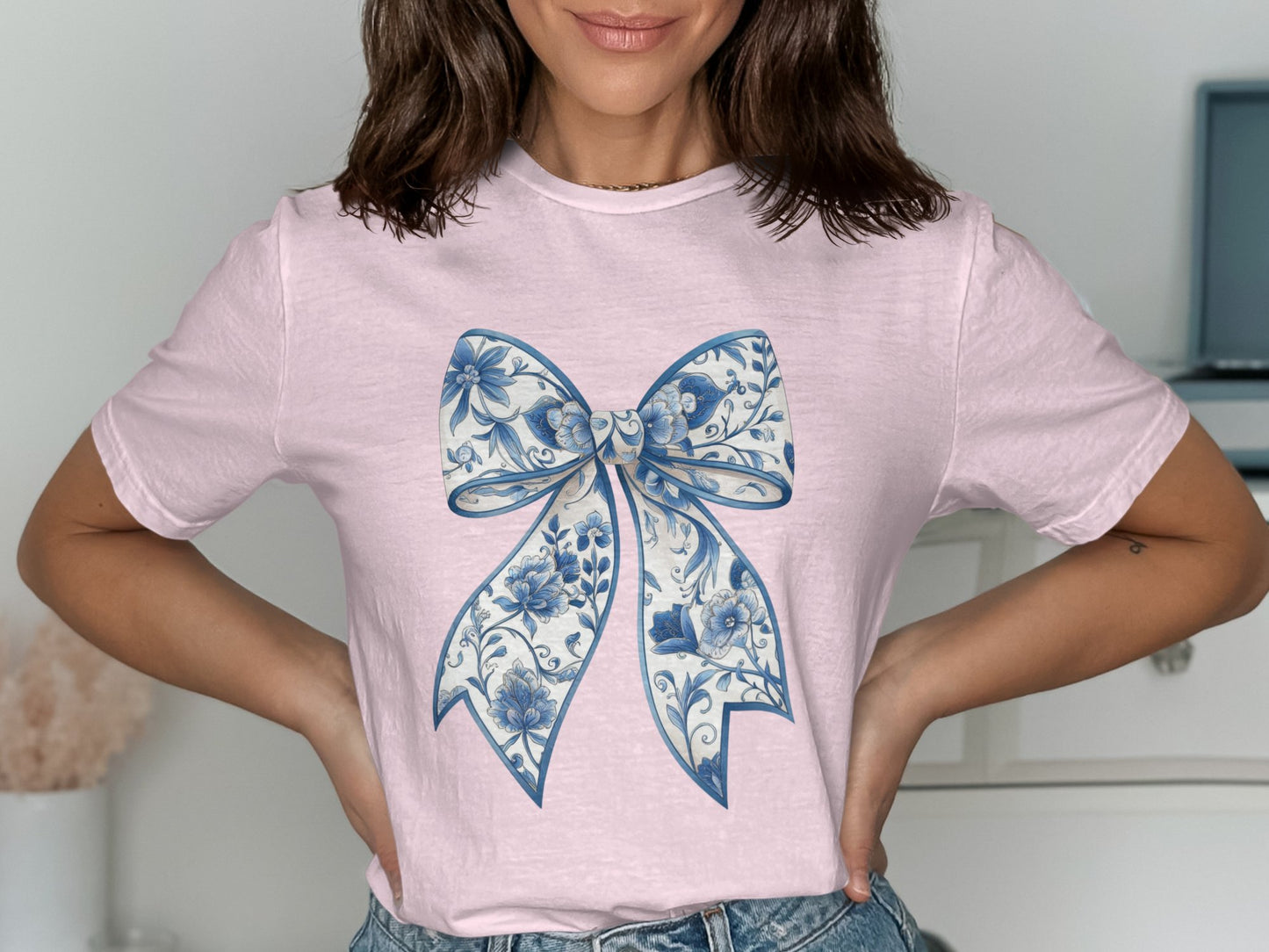 Stylish Pink T-Shirt with Blue Bow Graphic Design product