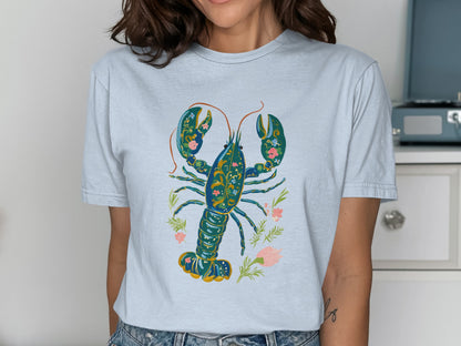 Light blue t-shirt with a dark blue lobster and floral design.