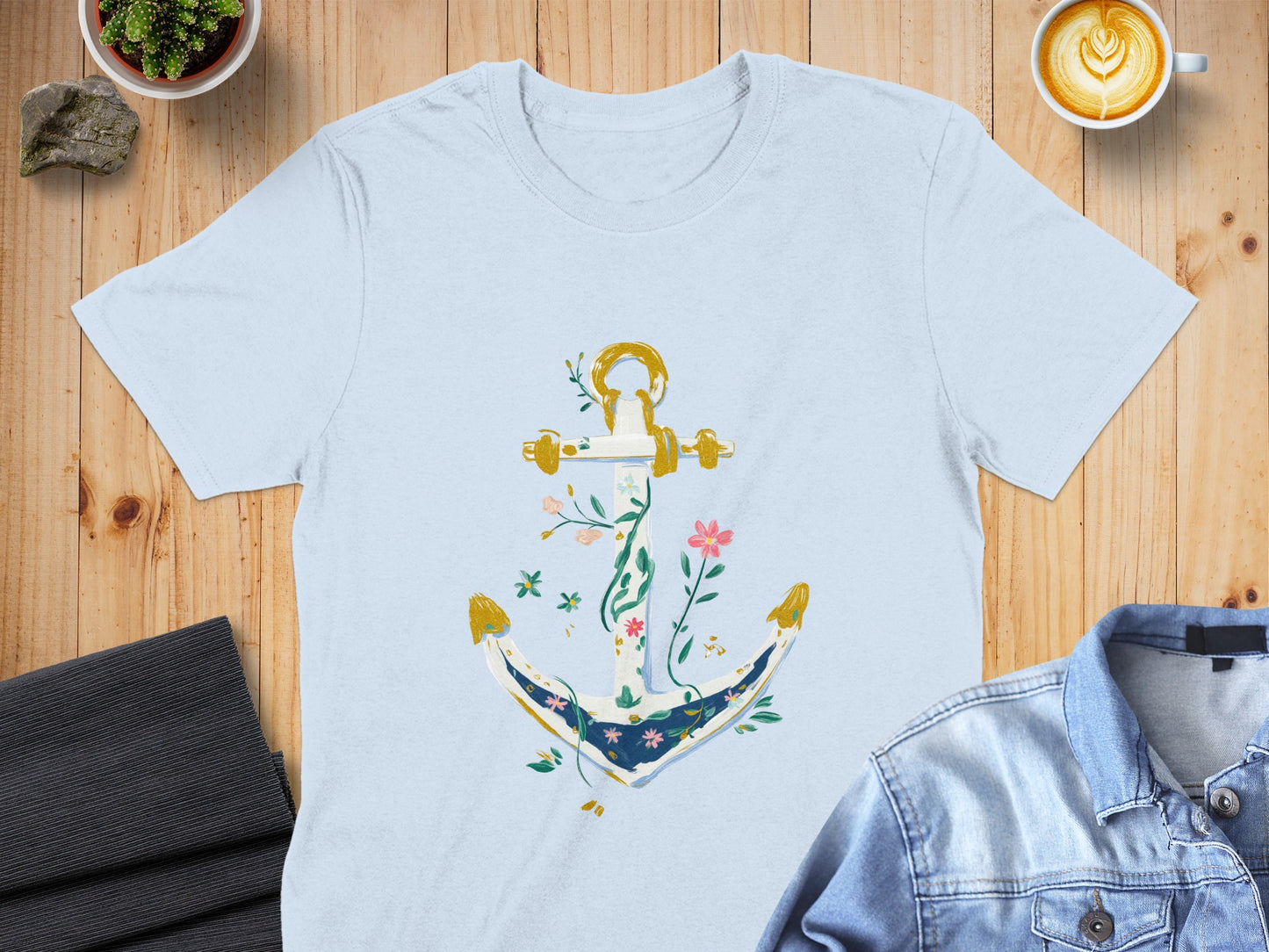Light blue t-shirt with a floral anchor graphic.