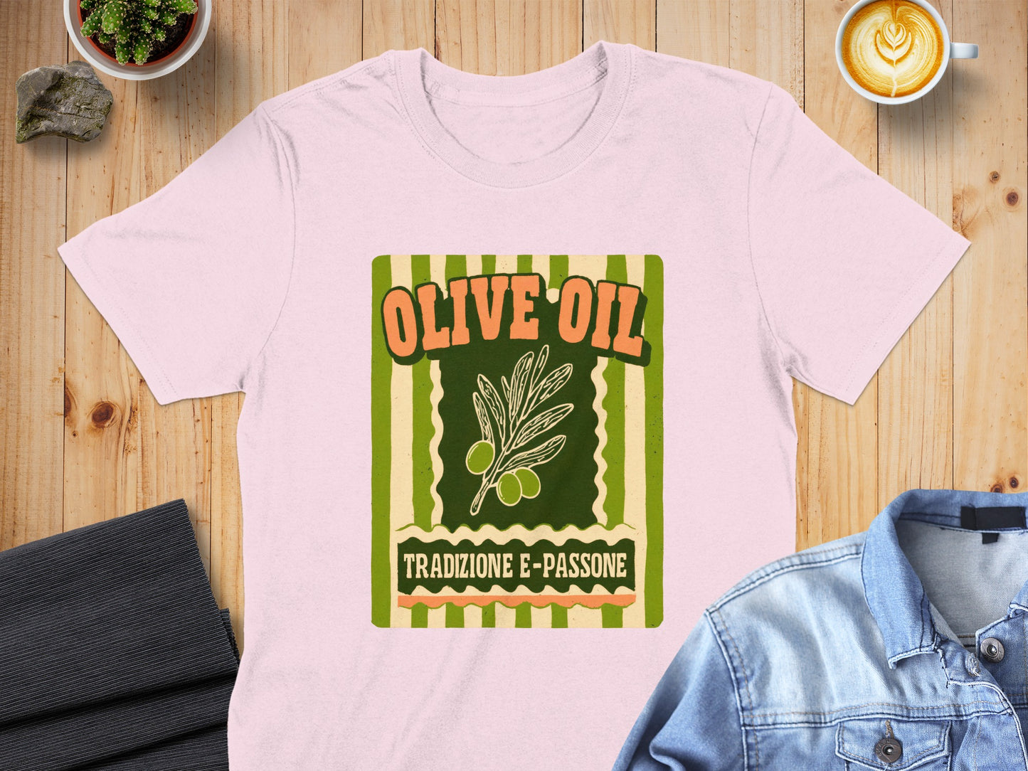 Pink t-shirt with "Olive Oil Tradizione E-Passione" and olive branch graphic.