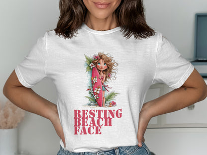 White t-shirt with graphic of a girl and a surfboard, "Resting Beach Face" text.