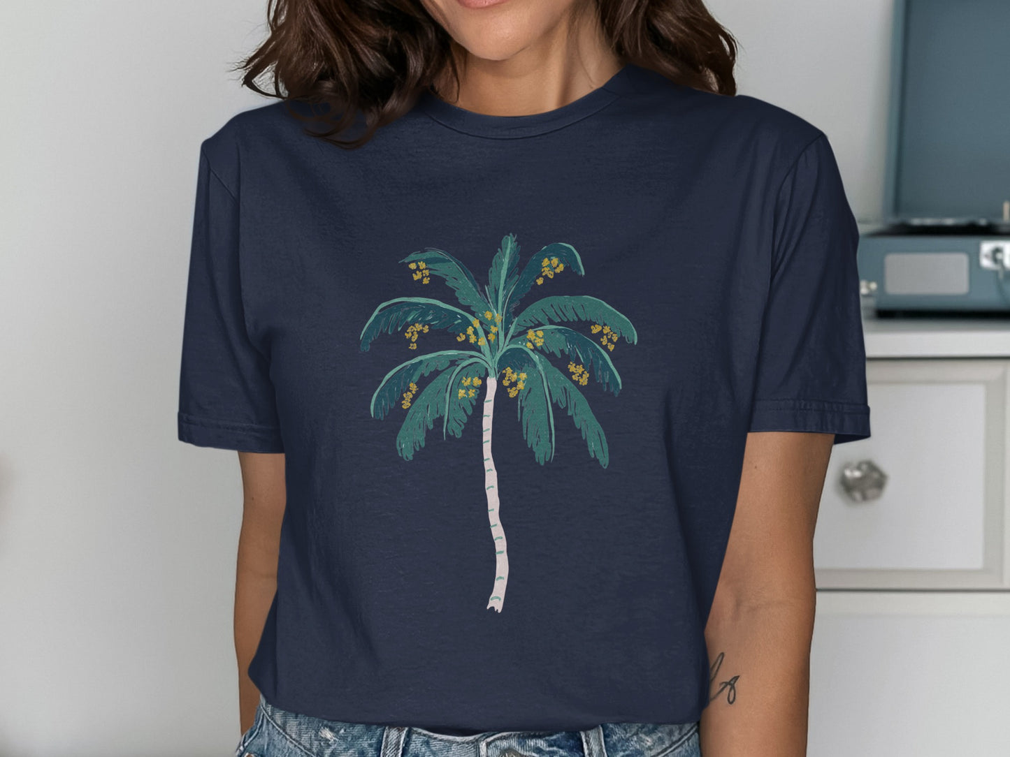 Navy t-shirt with a stylized palm tree design.