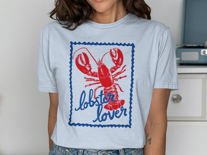 Light blue t-shirt with a red lobster and "lobster lover" text.