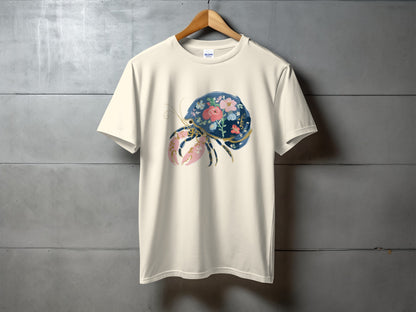 Cream t-shirt with a floral crab graphic.