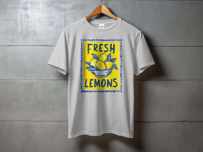White t-shirt with "FRESH LEMONS" text and a bowl of lemons illustration.