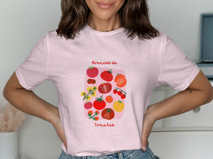Pink t-shirt with colorful tomato illustrations and the text "Nuances de Tomates".