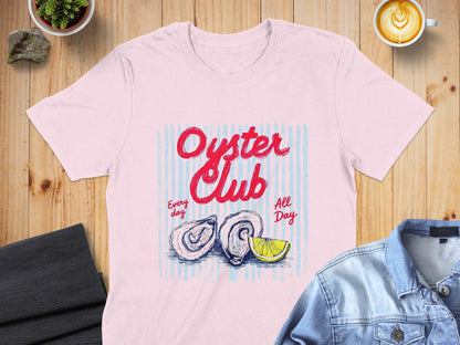 Pink t-shirt with "Oyster Club" text, two oysters, and lemon slice.