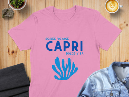Pink t-shirt with "Soirée Voyage Capri Dolce Vita" and blue coral graphic.