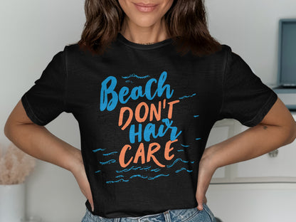 Black t-shirt with "Beach don't hair care" text in orange and blue.