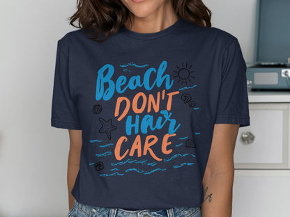 Dark blue t-shirt with "Beach Don't Hair Care" text and sun graphic.