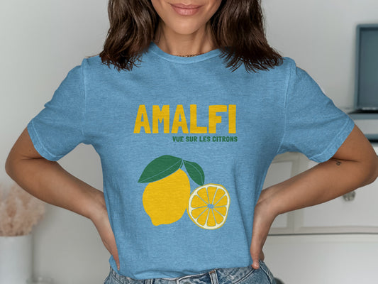 Blue t-shirt with yellow text "AMALFI VUE SUR LES CITRONS" and lemon graphic.