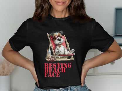 Black t-shirt with a dog in a beach chair wearing sunglasses and "RESTING BEACH FACE" text.