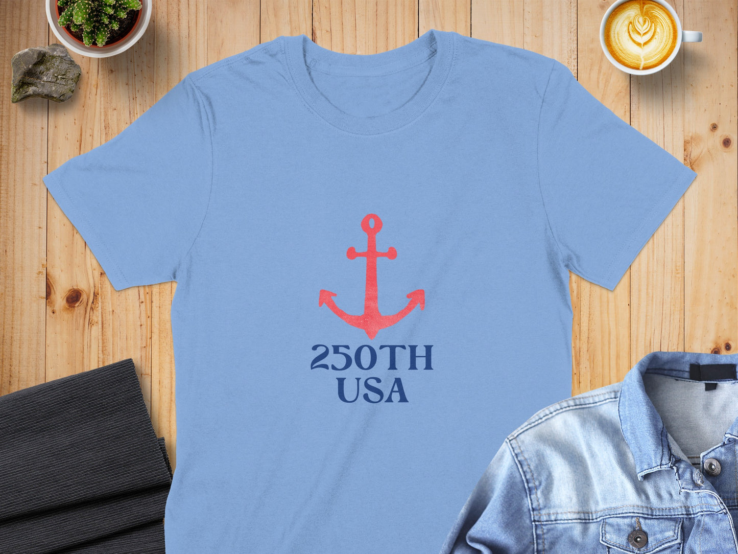 Light blue t-shirt with a red anchor and "250TH USA" text.