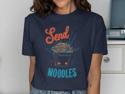 Dark blue t-shirt with graphic of a take-out noodle box and text "Send Noodles".