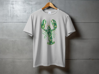 White t-shirt with green lobster graphic and floral accents.