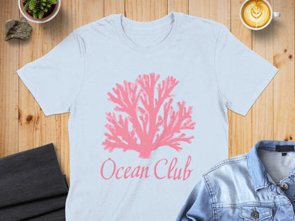Light blue t-shirt with a pink coral graphic and "Ocean Club" text.