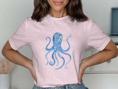 Light pink t-shirt with a blue watercolor octopus design.