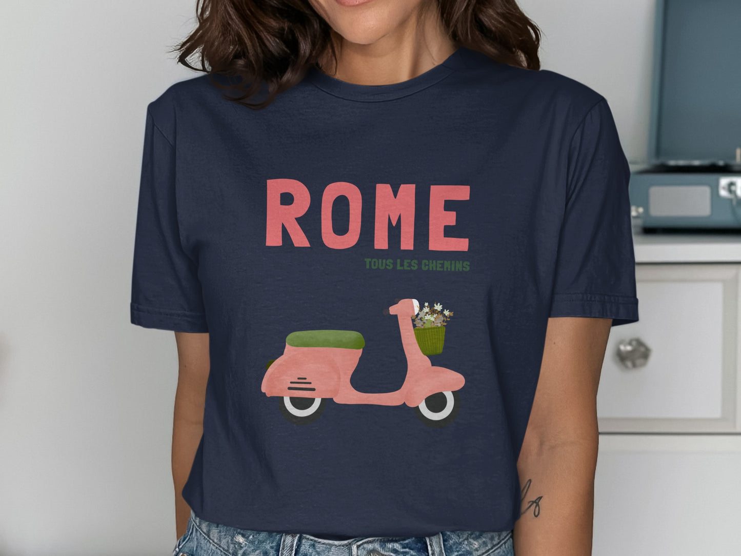 Navy t-shirt with "ROME TOUS LES CHEMINS" and a pink scooter with a basket of flowers.