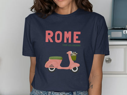 Navy t-shirt with "ROME TOUS LES CHEMINS" and a pink scooter with a basket of flowers.