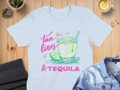 Light blue t-shirt with "tan lines & tequila" graphic of a margarita.