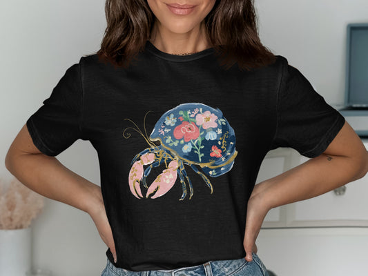 Black t-shirt with a floral hermit crab graphic.
