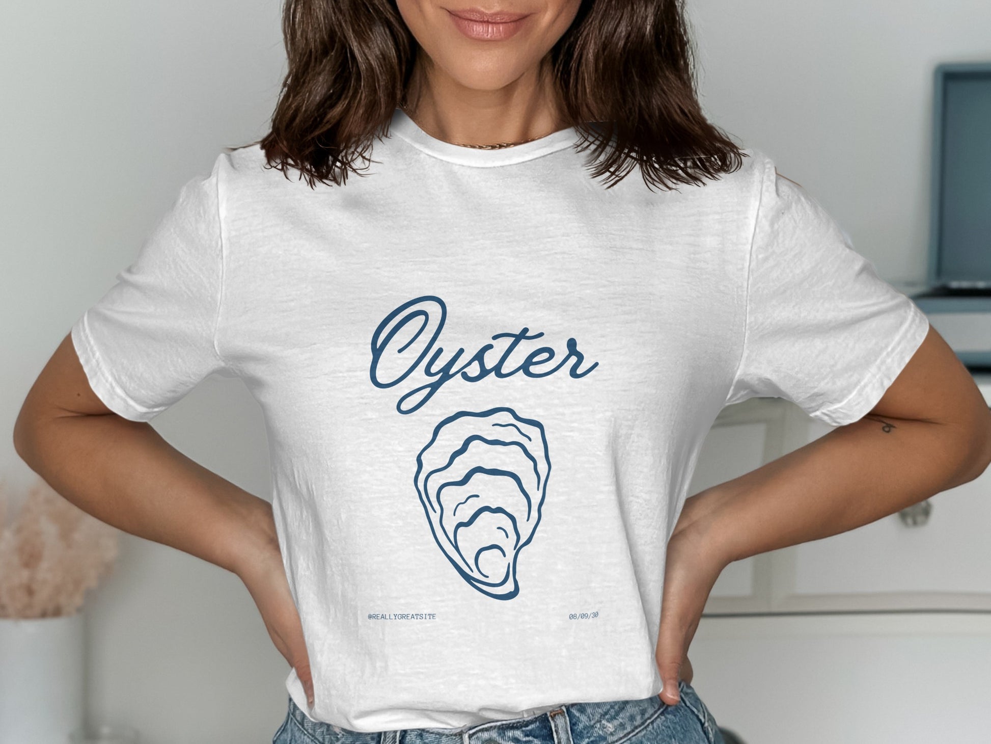 White t-shirt with a blue oyster graphic and "Oyster" text.