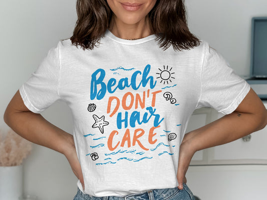 White t-shirt with "Beach Don't Hair Care" text and beach-themed doodles.