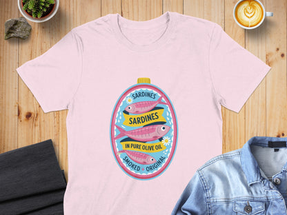 Pink t-shirt with oval graphic of three sardines in olive oil.
