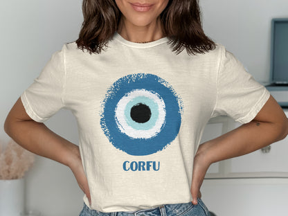 Cream t-shirt with blue evil eye graphic and "CORFU" text.