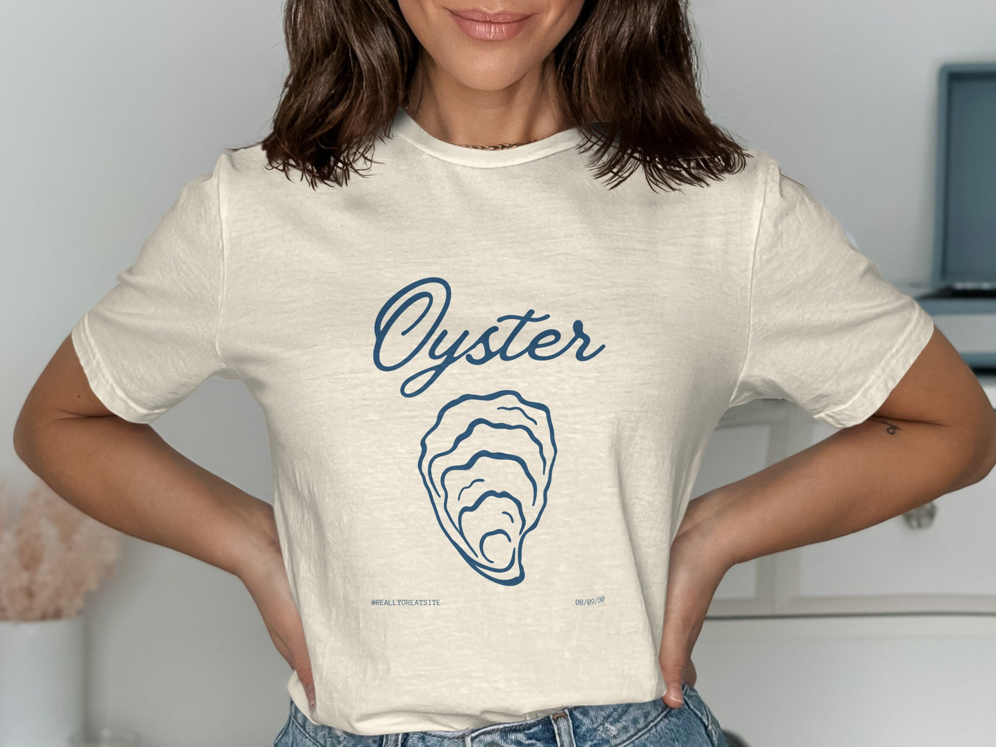 Cream t-shirt with an oyster illustration and "Oyster" text.