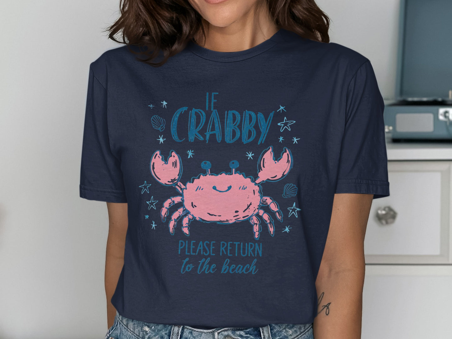 Pink cartoon crab with text "If Crabby, Please Return to the Beach."
