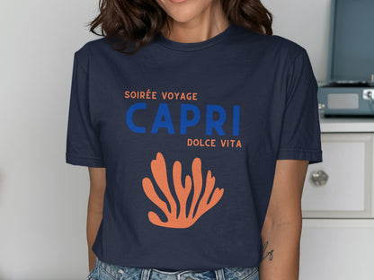 Navy t-shirt with "Soirée Voyage Capri Dolce Vita" and orange coral graphic.