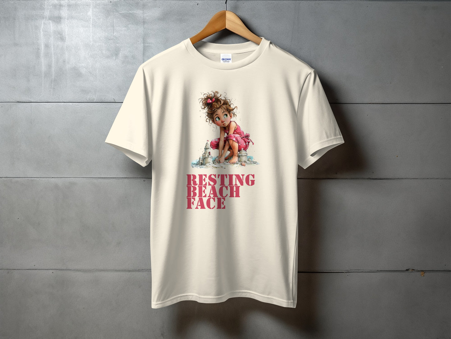 Cream t-shirt with girl and "RESTING BEACH FACE" text.