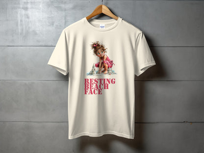 Cream t-shirt with girl and "RESTING BEACH FACE" text.