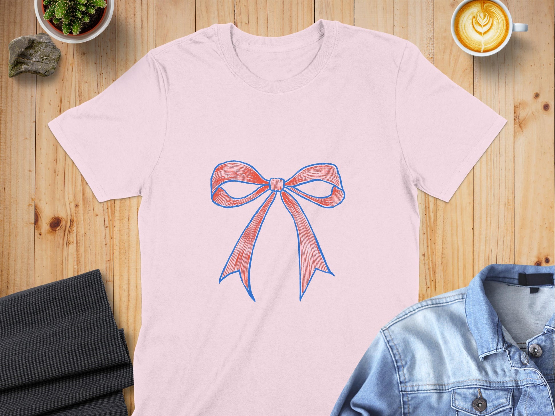 Pink Shirt with Red and Blue Bow Design product type