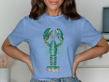 Light blue t-shirt with a detailed teal and gold lobster graphic.